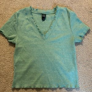 Light green, crop top, t shirt.